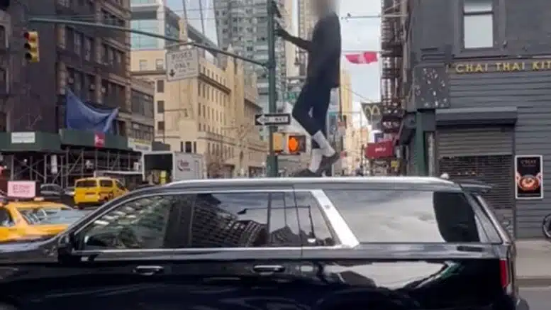NYC carjacking suspect lies in front of bus, stands on SUV: 'He almost killed like 4 people'